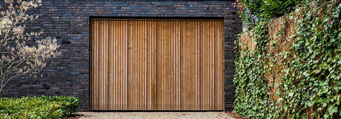 Amarr Traditional Garage Doors Tracks Repair in Calgary, Alberta