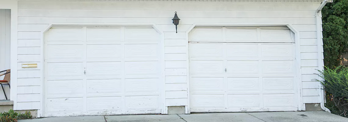 Roller Garage Door Dropped Down Replacement in Calgary, AB