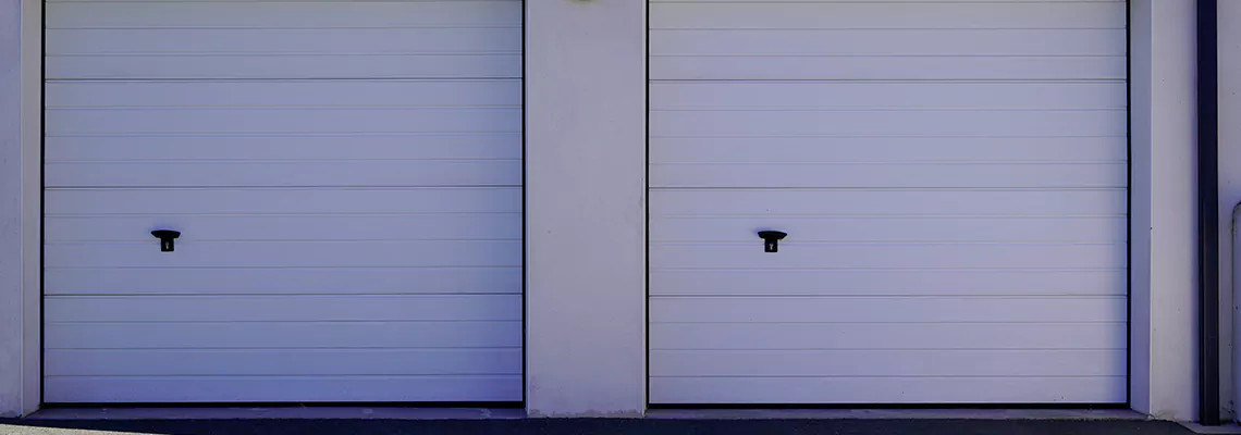 >Sectional Garage Doors Spring Repair in Calgary, AB