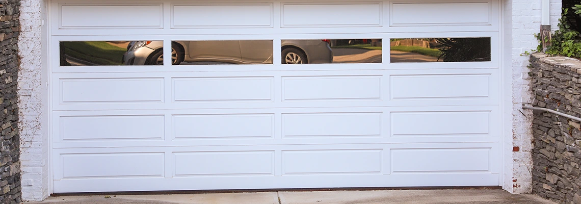 Wood Garage Door Bang Sound Repair in Alberta