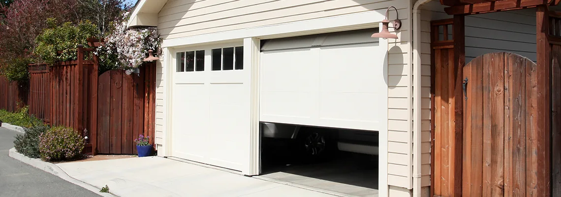 Fix Metal Garage Door Jerking in Calgary, Alberta